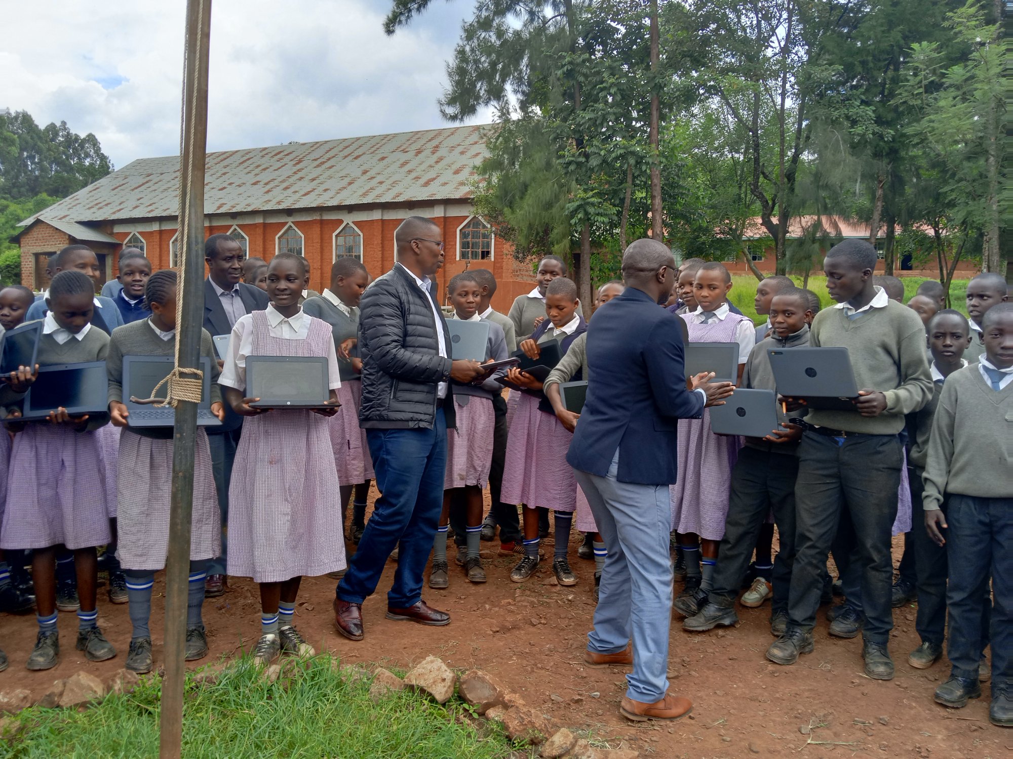 Students learning with laptops